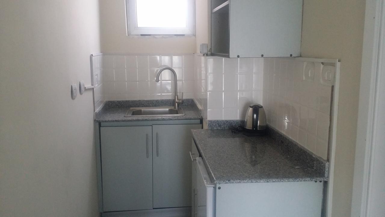 Afro Addis Hotel Apartment Bagian luar foto