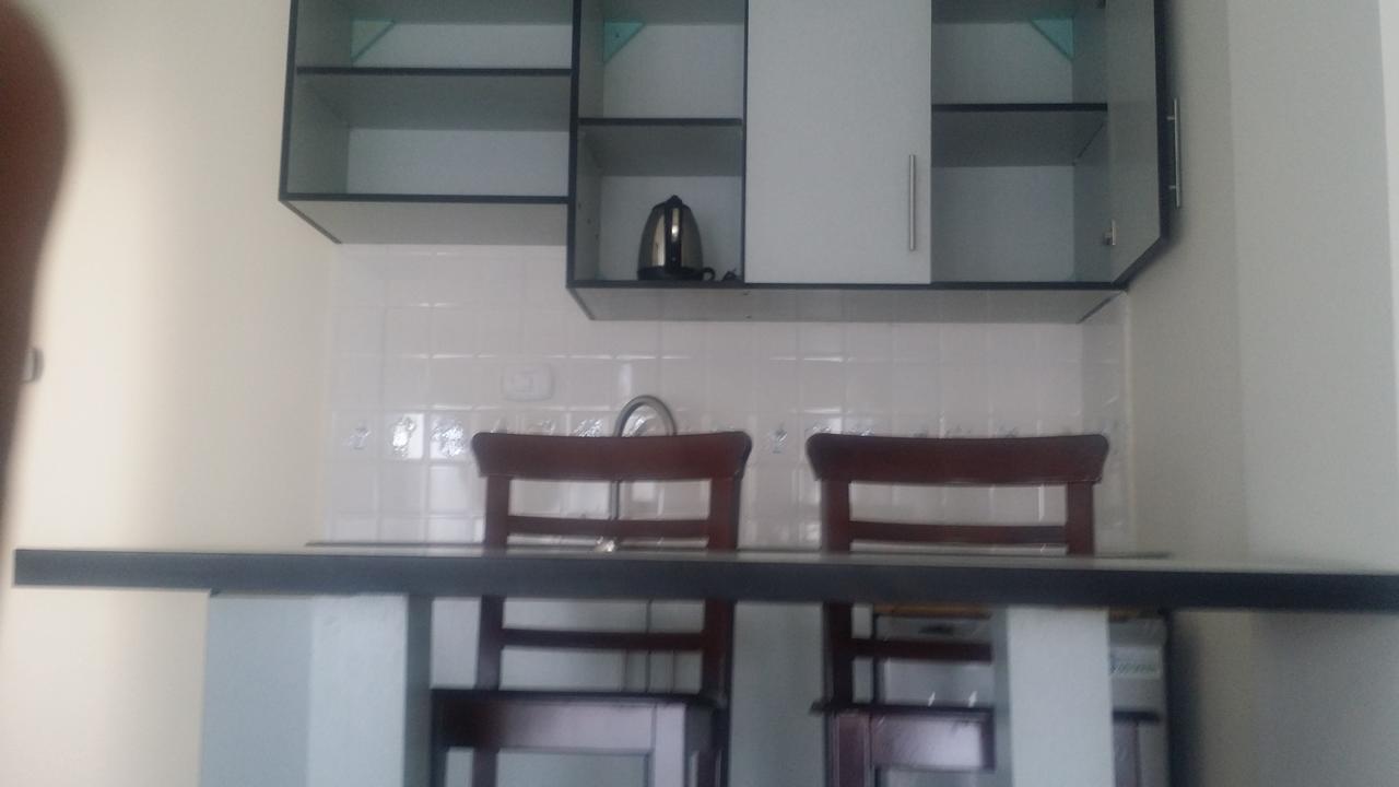 Afro Addis Hotel Apartment Bagian luar foto