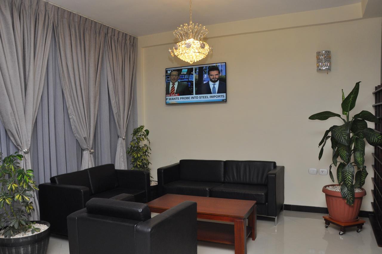 Afro Addis Hotel Apartment Bagian luar foto